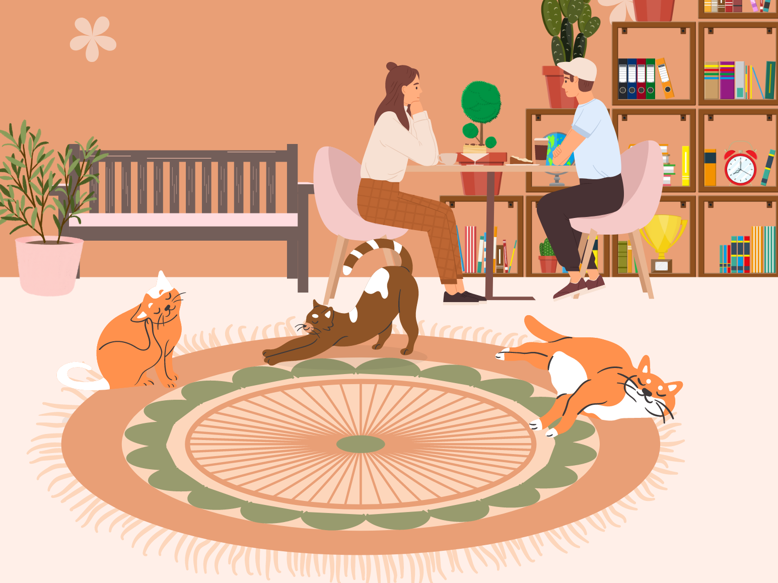 cats stretched out on a rug and some folks drinking hot beverages at a table